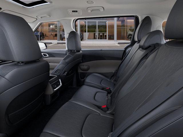 Photo of 2026 Snow White Kia Carnival Hybrid