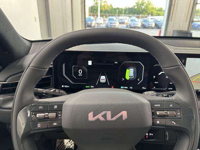 Photo of 2026 Glacier White Pearl/Ebony Black Roof Kia EV9
