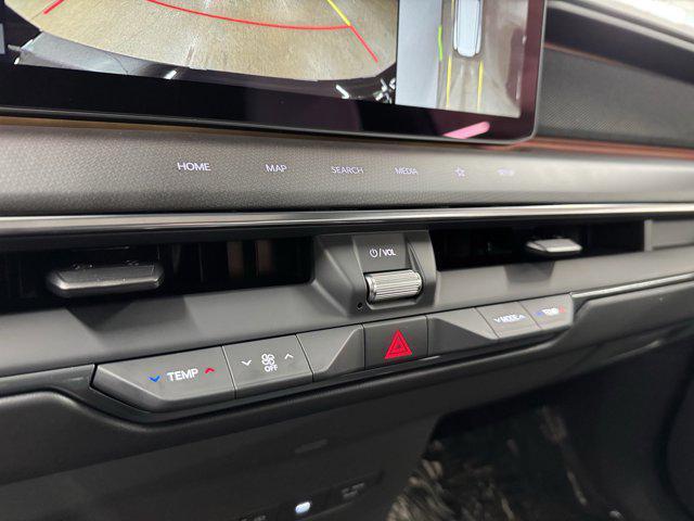 Photo of 2026 Glacier White Pearl/Ebony Black Roof Kia EV9