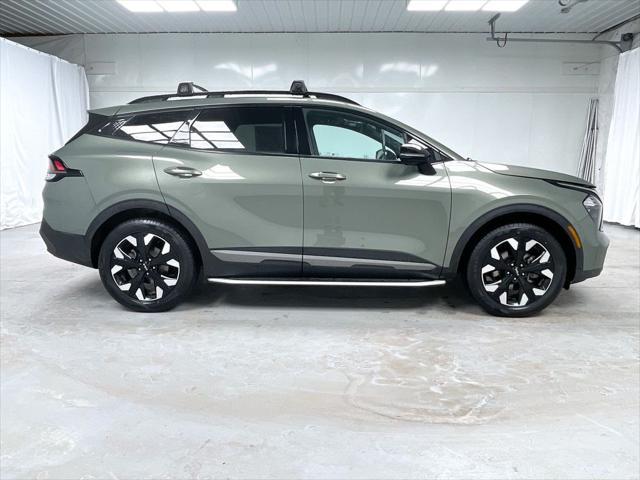 Photo of 2023 Jungle Green Kia Sportage