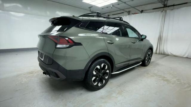 Photo of 2023 Jungle Green Kia Sportage