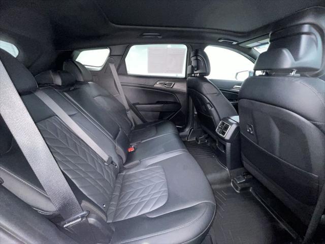 Photo of 2023 Jungle Green Kia Sportage