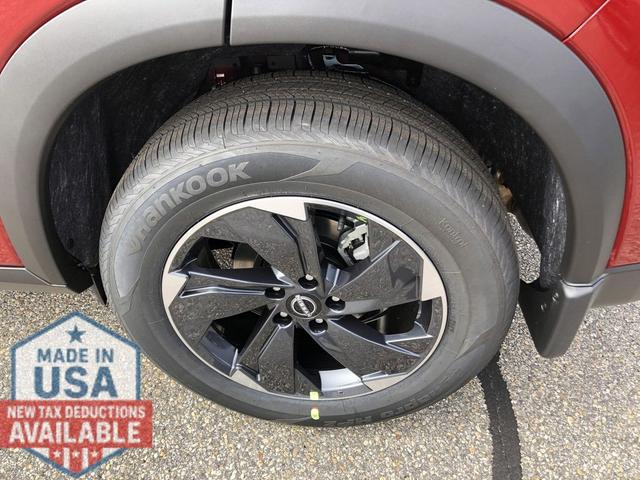 Photo of 2026 Scarlet Ember Tintcoat Nissan Rogue