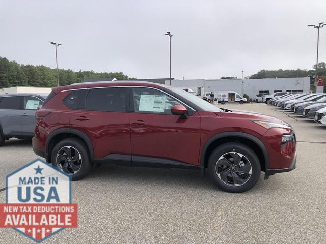 Photo of 2026 Scarlet Ember Tintcoat Nissan Rogue