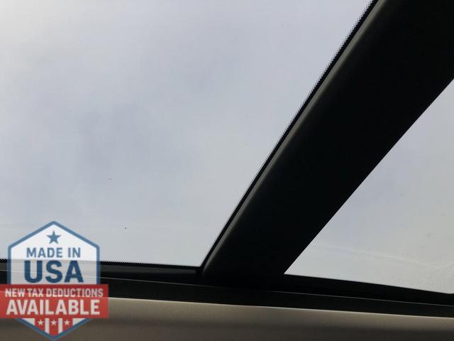 Photo of 2026 Scarlet Ember Tintcoat Nissan Rogue