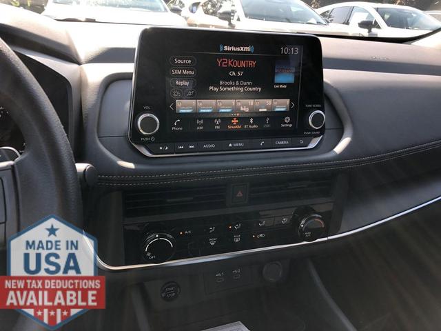 Photo of 2026 Scarlet Ember Tintcoat Nissan Rogue
