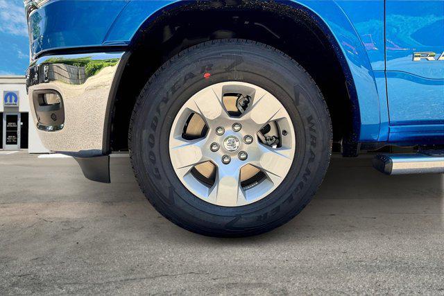 Photo of 2025 Hydro Blue Pearlcoat RAM 1500