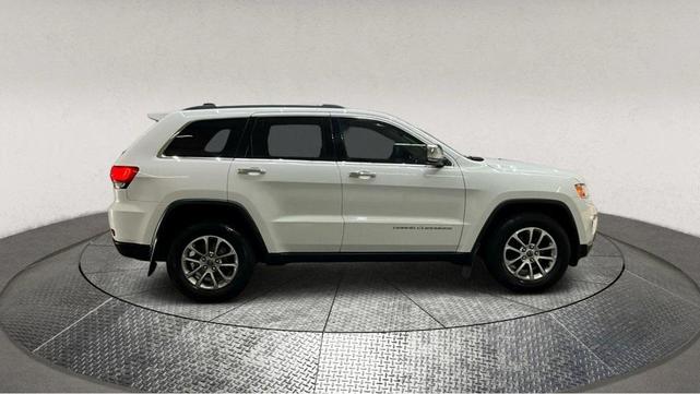 Photo of 2015 Bright White Clearcoat Jeep Grand Cherokee