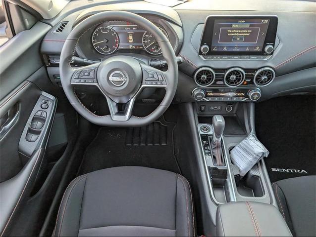 Photo of 2025 Aspen White Tricoat/Super Black Nissan Sentra