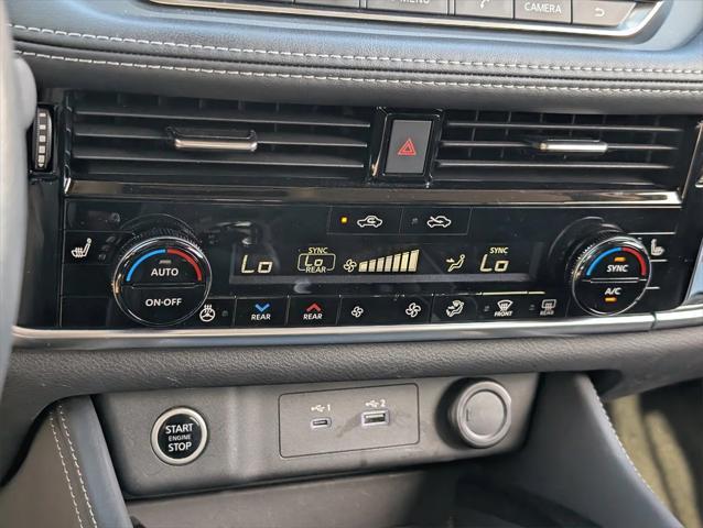 Photo of 2022 Super Black Nissan Rogue
