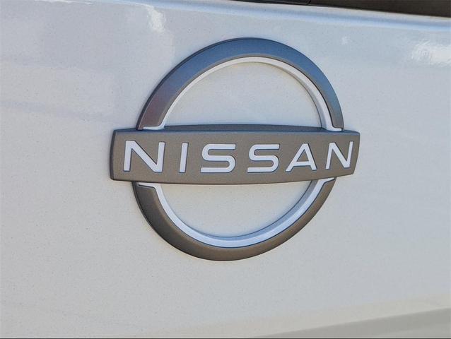Photo of 2025 Glacier White Nissan Frontier