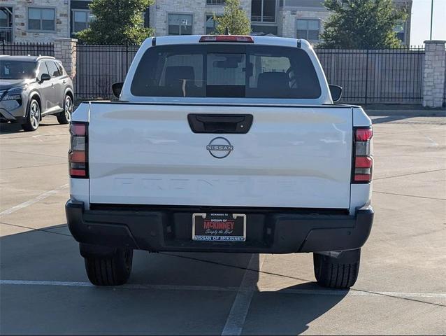 Photo of 2025 Glacier White Nissan Frontier