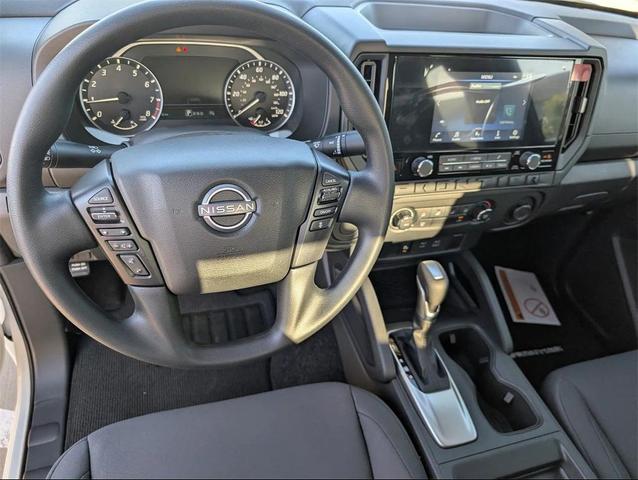 Photo of 2025 Glacier White Nissan Frontier