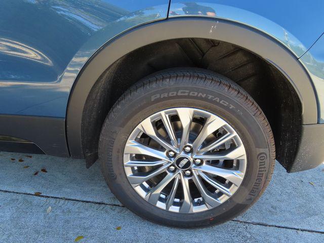 Photo of 2025 Deep Sea Metallic Cadillac XT4