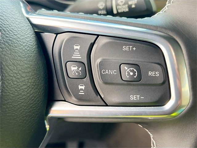 Photo of 2021 Snazzberry Pearlcoat Jeep Wrangler Unlimited