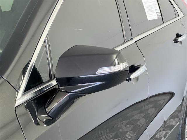 Photo of 2022 Stellar Black Metallic Cadillac XT4