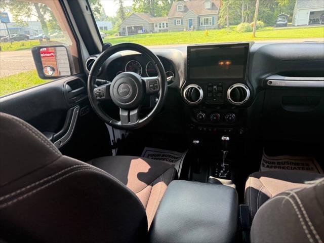 Photo of 2013 Bright White Clear Coat Jeep Wrangler Unlimited