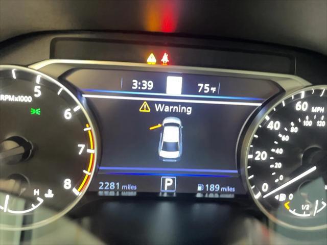 Photo of 2025 Pearl White Tricoat Nissan Altima