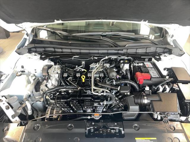 Photo of 2025 Pearl White Tricoat Nissan Altima