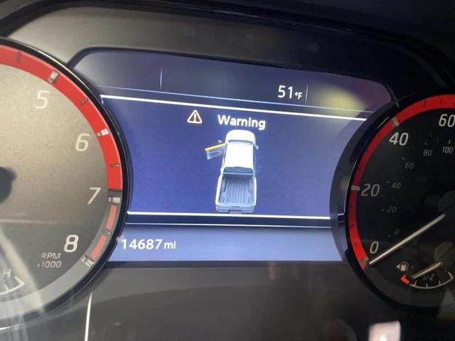 Photo of 2023 Tan Nissan Frontier