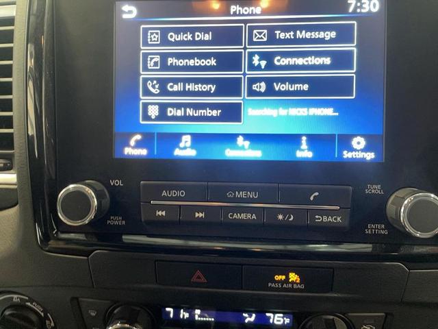 Photo of 2023 Glacier White Nissan Frontier