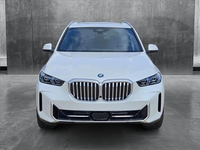 Photo of 2026 Mineral White Metallic BMW X5 PHEV