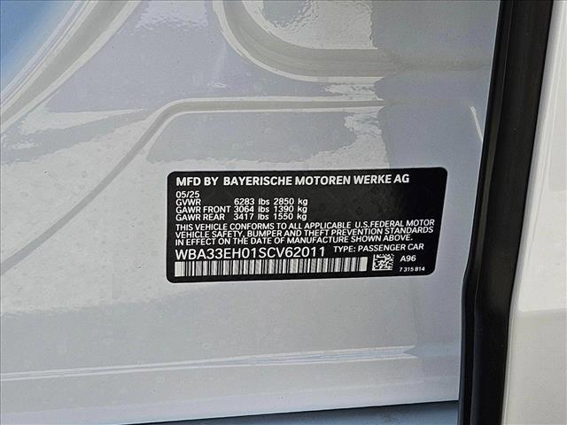 Photo of 2025 Mineral White Metallic BMW 740