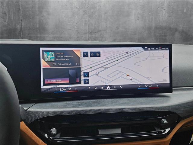 Photo of 2025 Mineral White Metallic BMW i4 Gran Coupe