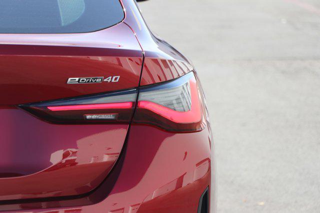 Photo of 2025 Vegas Red Metallic BMW i4 Gran Coupe