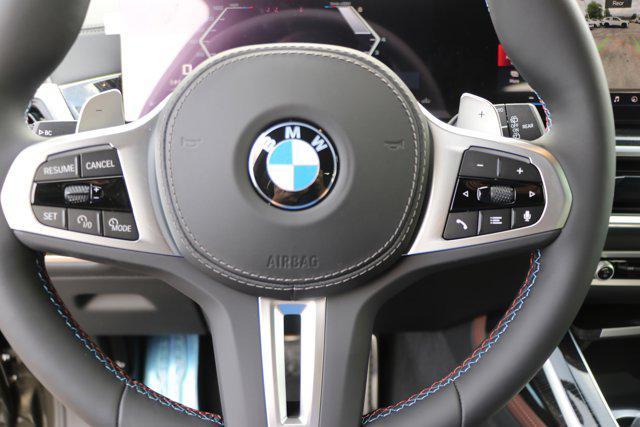 Photo of 2026 Manhattan Green Metallic BMW X7