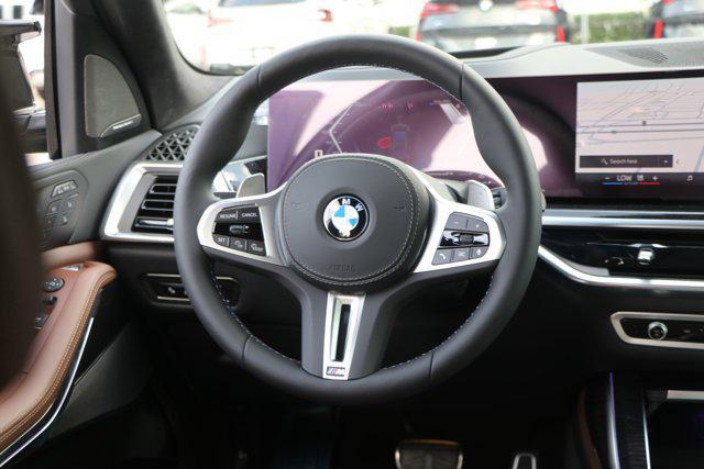 Photo of 2026 Manhattan Green Metallic BMW X7