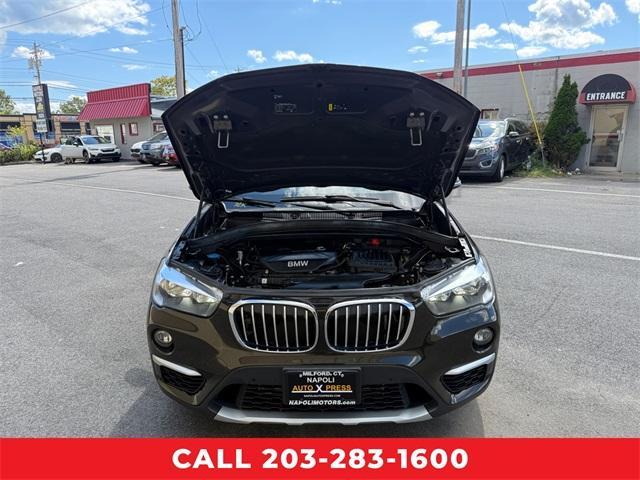 Photo of 2019 Dark Olive Metallic BMW X1