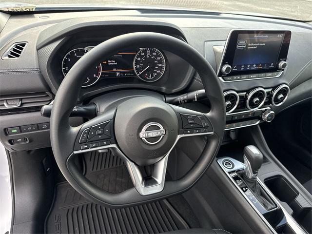 Photo of 2025 Aspen White Tricoat Nissan Sentra