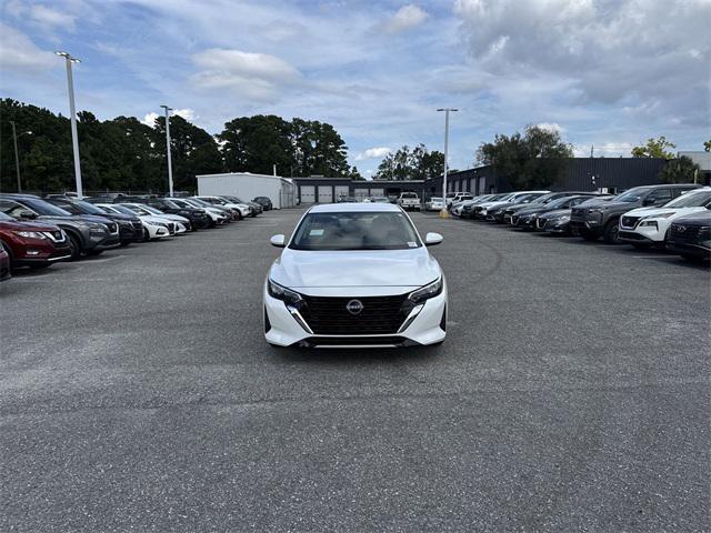 Photo of 2025 Aspen White Tricoat Nissan Sentra
