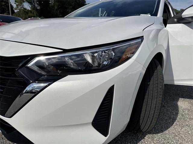 Photo of 2025 Aspen White Tricoat Nissan Sentra