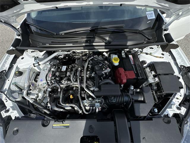 Photo of 2025 Aspen White Tricoat Nissan Sentra