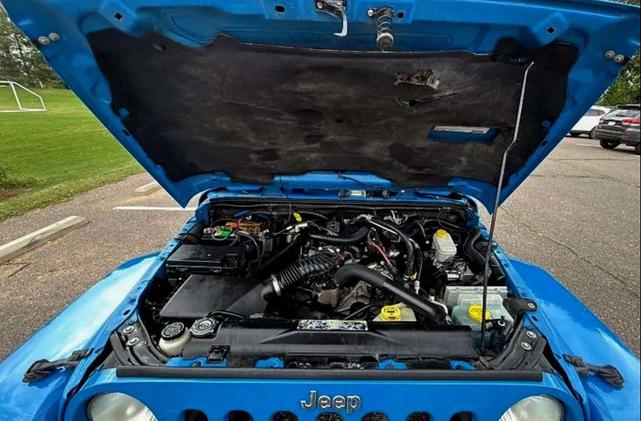 Photo of 2011 Cosmos Blue Jeep Wrangler