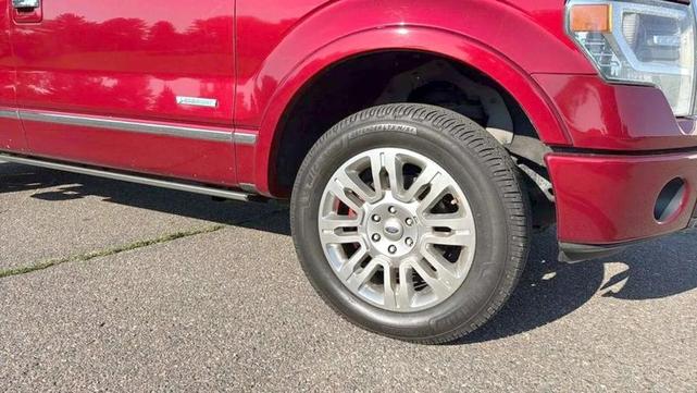 Photo of 2014 Ruby Red Metallic Tinted Clearcoat Ford F-150