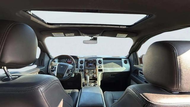 Photo of 2014 Ruby Red Metallic Tinted Clearcoat Ford F-150