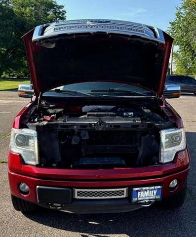 Photo of 2014 Ruby Red Metallic Tinted Clearcoat Ford F-150