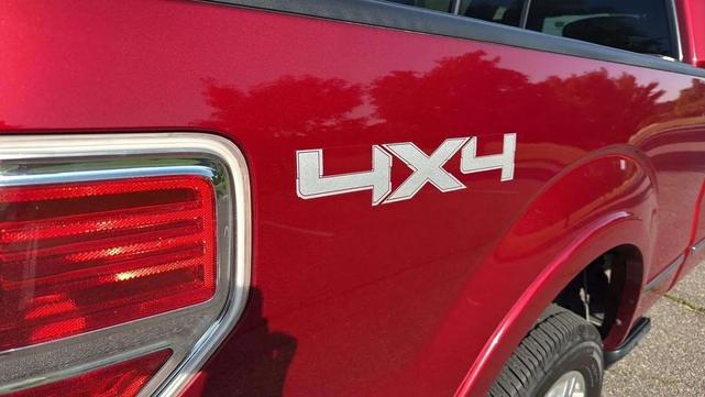 Photo of 2014 Ruby Red Metallic Tinted Clearcoat Ford F-150