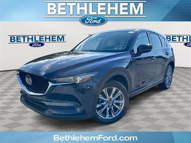 Photo of 2021 Deep Crystal Blue Mica Mazda CX-5