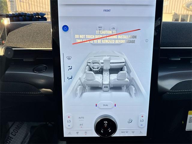 Photo of 2025 Star White Metallic Tri-Coat Ford Mustang Mach-E