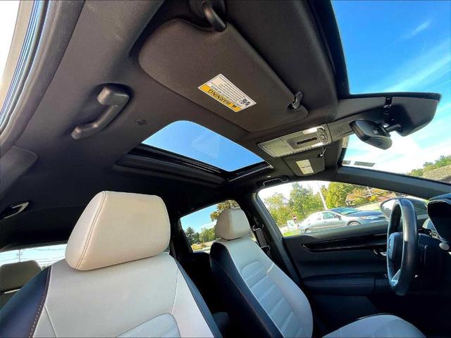 Photo of 2024 Meteorite Gray Metallic Honda CR-V Hybrid