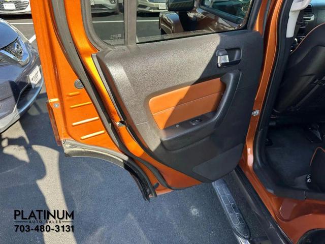 Photo of 2007 Orange Hummer H3