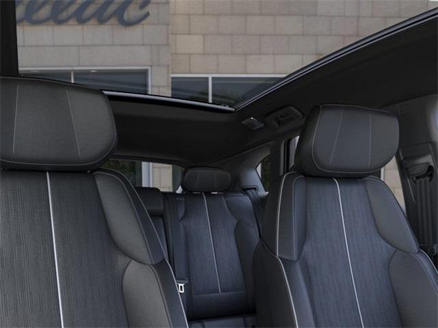 Photo of 2025 Radiant Red Cadillac OPTIQ