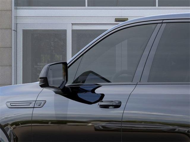 Photo of 2025 Black Raven Cadillac Escalade IQ