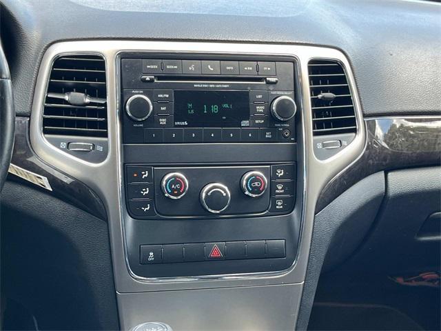 Photo of 2012 True Blue Pearlcoat Jeep Grand Cherokee