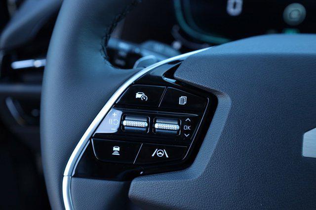 Photo of 2025 Mineral Blue Kia Niro
