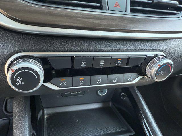 Photo of 2024 Super Black Nissan Altima